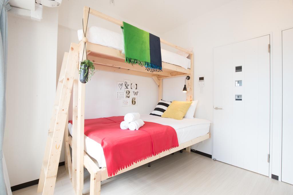 Uro Apartment Osaka Værelse billede
